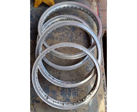 Four alloy rims, Dunlop WM2, 2 x Akront WM2 and Morad WM2 