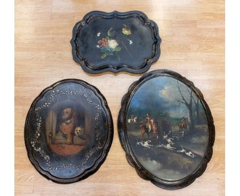 A Victorian black painted papier mache table top, painted with dogs and inlaid with mother of pearl, approx 67cm x 57cm; toge