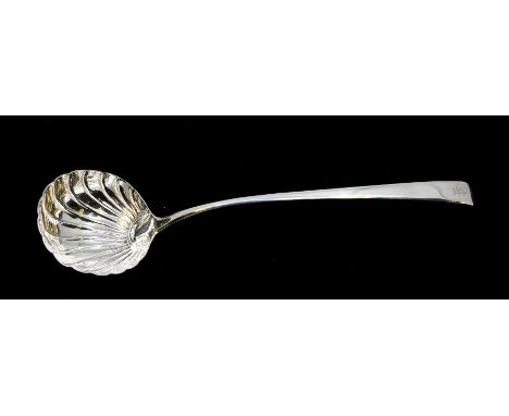 Irish Interest: A George III Irish silver soup ladle, plain tapering handle with shell shaped bowl, the handle engraved with 