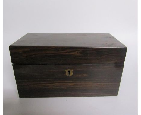 An early 19c Coromandel two compartment tea caddy bearing a label Field Maker 67 Regent Street London.  23cms w x 12cm deep. 