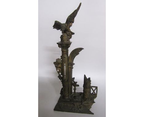 A Victorian gilt spelter ink stand with thermometer in the form of a classical column amongst a ruined entrance.  The column 