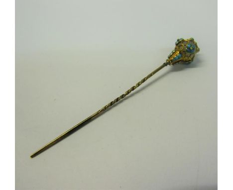 A gold orb stick pin with Turquoise bead decoration.  8cms l. 