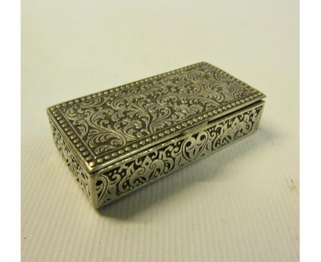 A Continental silver snuff box of rectangular scroll and leaf decorated form with hinged cover.  5.5cms l. 