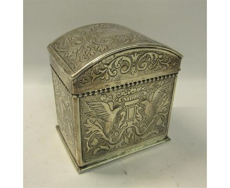 A Victorian silver early Keswick School of Industrial Art tea caddy with hinged dome cover.  Embossed arts and craft decorati