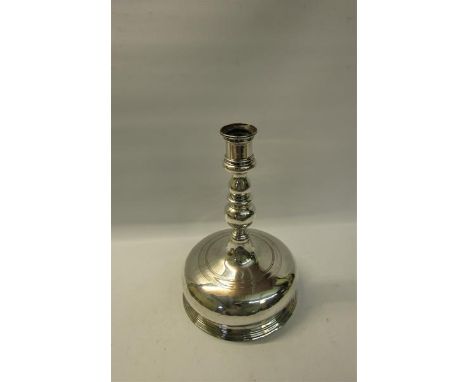 A 19c Continental silver bell base candlestick with a double knop stem and fixed socket with unattributed marks to base.  26c