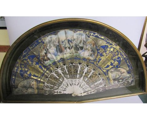 A late 18/early 19c white bone and paper fan, the sticks pierced and gilded, the fan leaf decorated with domestic scenes with