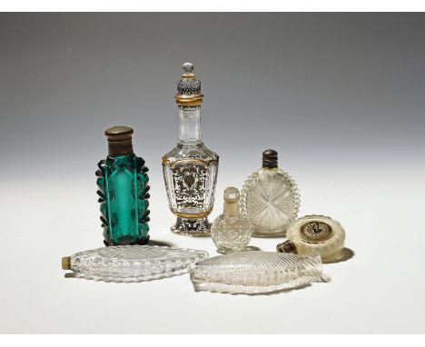 Seven glass scent bottles or flasks  19th/early 20th century, one Lobmeyer with schwarzlot decoration of peacocks between fol