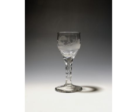 A small wine glass  c.1770, the rounded bowl engraved with a continuous hunting scene, a figure on horseback trailing two dog