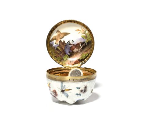 A German porcelain snuff box or bonbonnière c.1770, moulded as a large ruffled flower bud, painted with small floral sprigs a