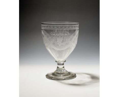 A ceremonial glass or mixing rummer  dated 1801, engraved in the manner of James Giles with the Bucrania pattern of bulls' he