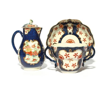 A Worcester hot water jug and cover  c.1765, painted with panels of flowers and tied corn stooks in the Kakiemon palette, and