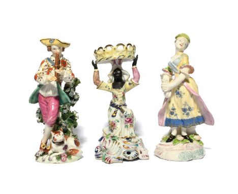 Three English porcelain figures c.1756-60, including a Bow figure of the Sailor's Lass, wringing her handkerchief, a Bow swee