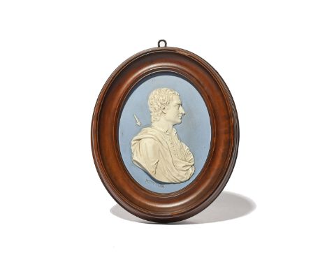 A Wedgwood Jasperware portrait plaque of Sir Isaac Newton  late 18th/19th century, modelled as a younger man, in profile and 