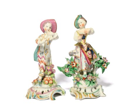 A near pair of Bow figures of the New Dancers c.1760, modelled as a boy and girl posed on tall pierced scroll bases beside a 