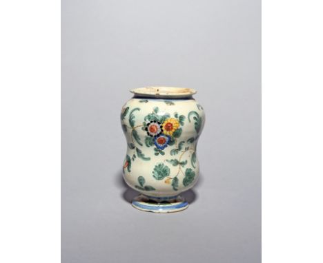 A Pesaro maiolica albarello  late 18th century, possibly from the workshop of Casili e Callegari, the waisted form painted wi