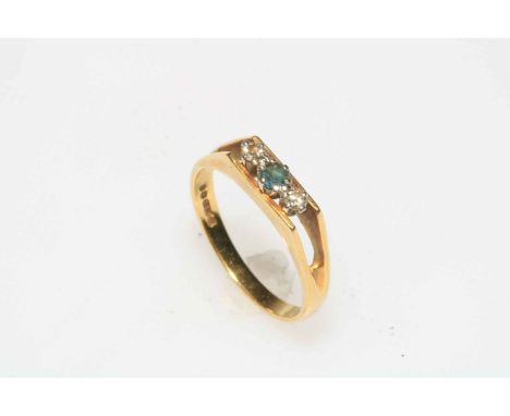 18 carat gold three stone sapphire and diamond ring, size M.