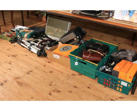 Large collection of photographic equipment including cased Canon F1 camera, lenses and accessories, other cameras, binoculars