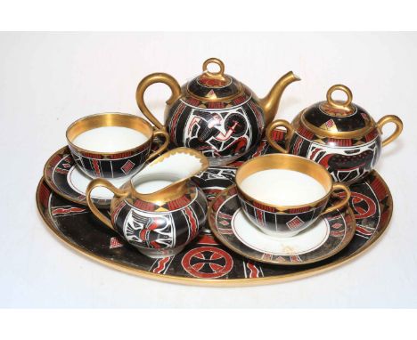 Limoges Cabaret eight piece tea for two service with Egyptian style decoration.