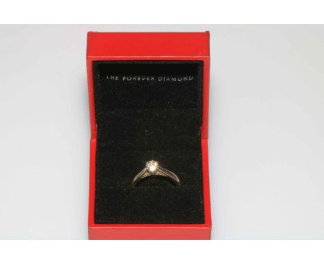 Solitaire diamond (.44 carat) and 18 carat white gold ring, size M, with The Forever Diamond certificate and box.