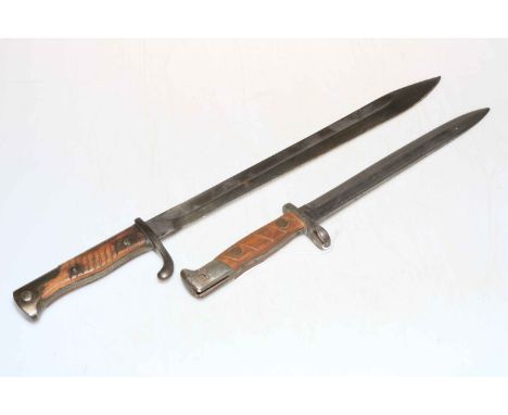 Two German Bayonets, one if by maker V.C. Schilling Suhl, 10 inch blade, marked 13. R. 10. 72., and the other is marked Erfur