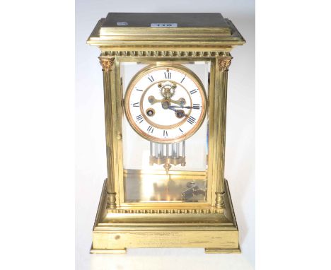 Gilt brass mantel clock having ornate case and enamel dial, 30cm high.