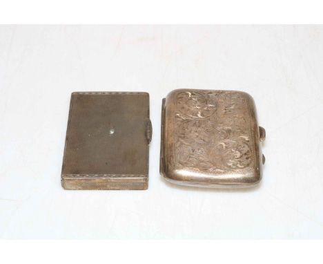 Engraved silver cigarette case and engine turned silver card case.