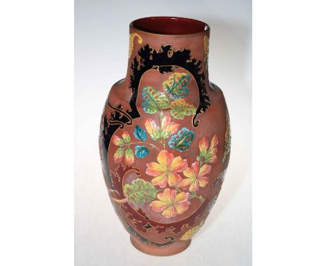 Large Sarreguemines French pottery vase with enamel floral decoration, 40cm.