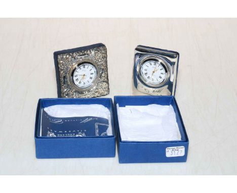 Two R. Carr sterling silver mantel clocks, boxed.