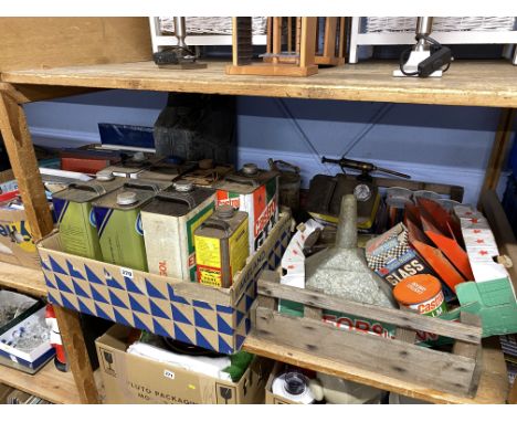 Shelf of vintage tins, cans and containers