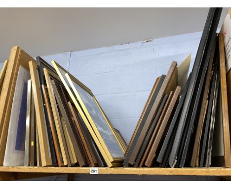 Shelf of original and printed artwork, to include a farmhouse watercolour, local coloured prints, and an aboriginal style pri