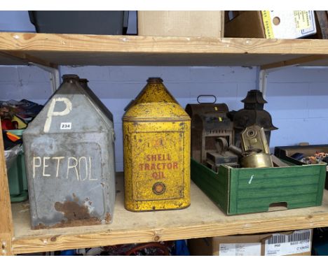Shelf of lanterns and oil containers