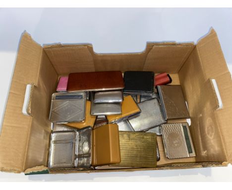 A box of vintage leather and other cigarette cases