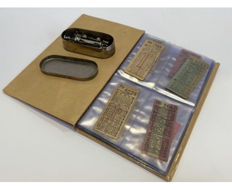 An album of vintage tram and bus tickets and a surgical needle set