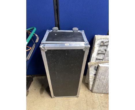 A hard shell flight case or musical instrument case