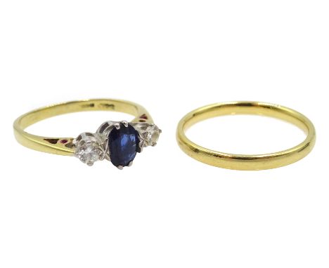 18ct gold three stone oval sapphire and round brilliant cut diamond ring, stamped 750 and an 18ct gold band hallmarked Condit