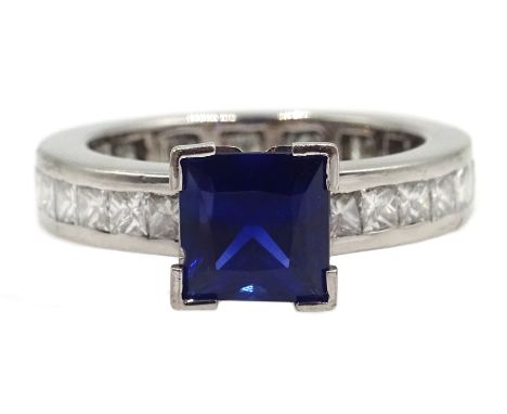 18ct white gold square cut sapphire ring with channel set diamond shank, stamped 750 Condition Report Sapphire 6mm, diamonds 