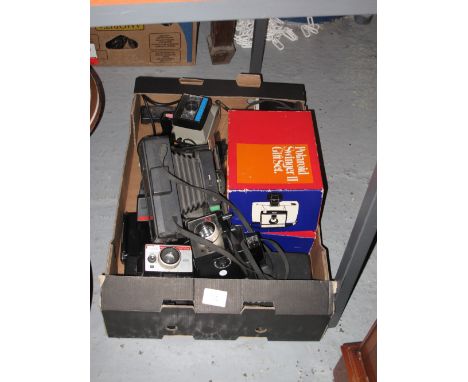 Tray of assorted vintage Polaroid cameras.  (various)