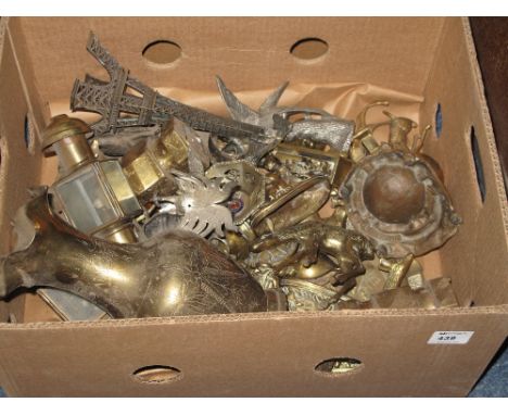 Box of assorted metal ware to include metal study of The Eiffel Tower, brass wall lamp, baluster vase, white metal cockrells,