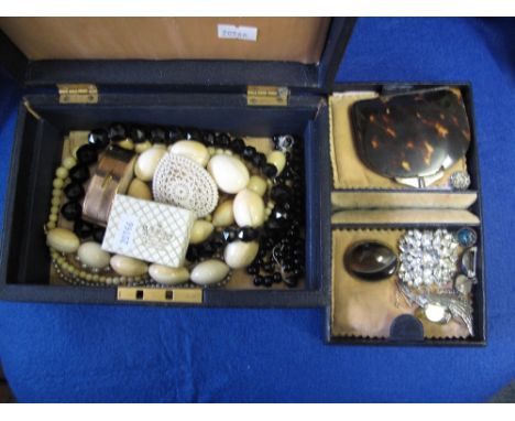 Leather covered jewellery box containing hardstone, marquisette and other costume jewellery items, string of large ivory bead