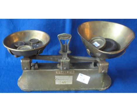 Pair of 2lbs kitchen scales with copper dishes and weights.