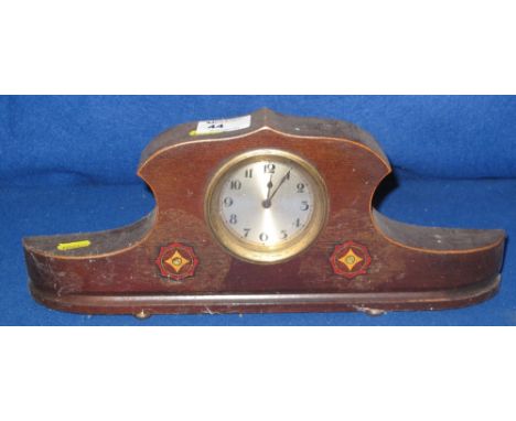 Early 20th Century oak, hat shaped, boudoir clock with back winding movement.