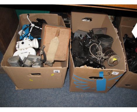 Two boxes of assorted camera and other equipment to include vintage pathescope, Noris junior camera, camera bags etc.  (2)