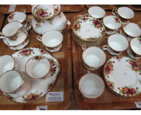 Two trays of Royal Albert Old Country Roses bone china part tea ware items comprising tea cups, saucers, plates, milk jug, su