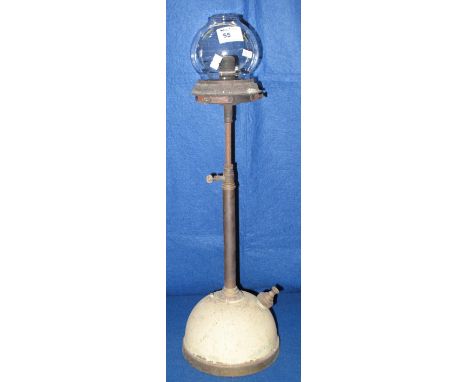 Tilly type pressure lamp with clear glass shade.