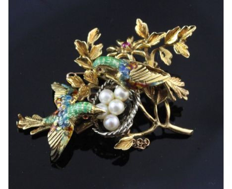 A 1960's Italian 18ct gold, ruby, cultured pearl and enamel brooch, modelled as two birds with nest of eggs amongst foliage, 