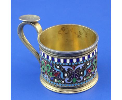 A late 19th century Russian 84 zolotnik silver gilt and cloisonne enamel cup by Khlebnikov, with scrolling enamel decoration 