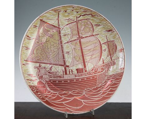 A William de Morgan ruby and sepia lustre 'Swallows' charger, c.1881, painted by Charles Passenger, with a stylised galleon s