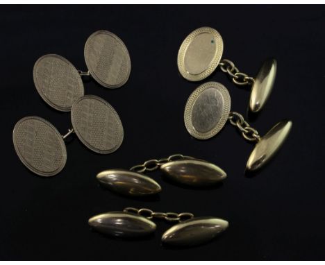 A pair of early 20th century 18ct gold oval cufflinks with engine turned border and two other pairs of gold cufflinks, 9ct an
