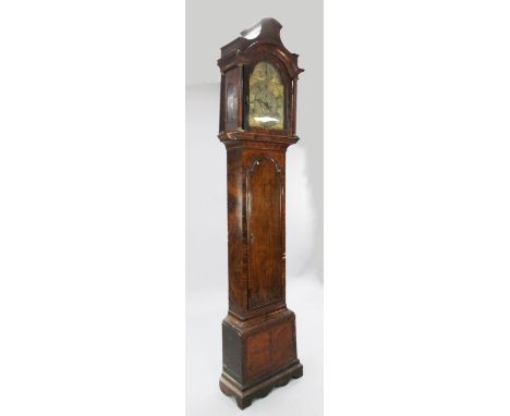 Jasper Taylor of Holborn, London. A mid 18th century walnut eight day longcase clock, the 12 inch arched brass dial with stri