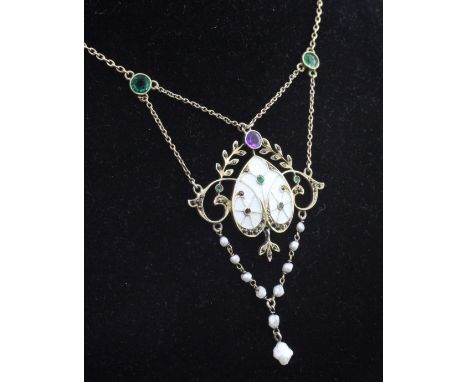An Edwardian silver gilt, enamel, baroque pearl, marcasite and coloured paste set drop "Suffragette" pendant, the central mot
